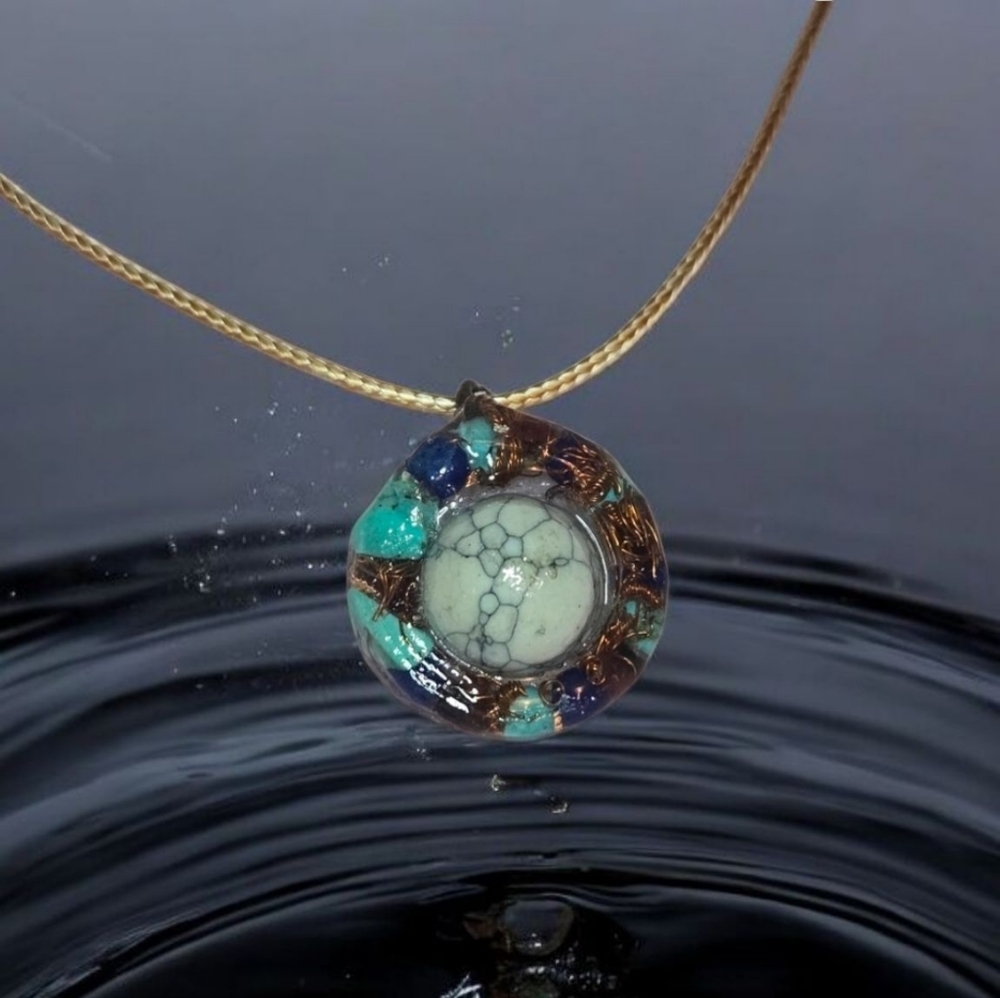 Artisan Turquoise Lapis Lazuli and Garnet Pendant Necklace With Howlite Sphere